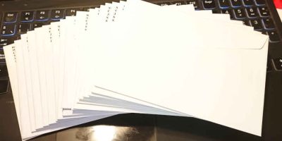 18 Christmas cards in their envelopes